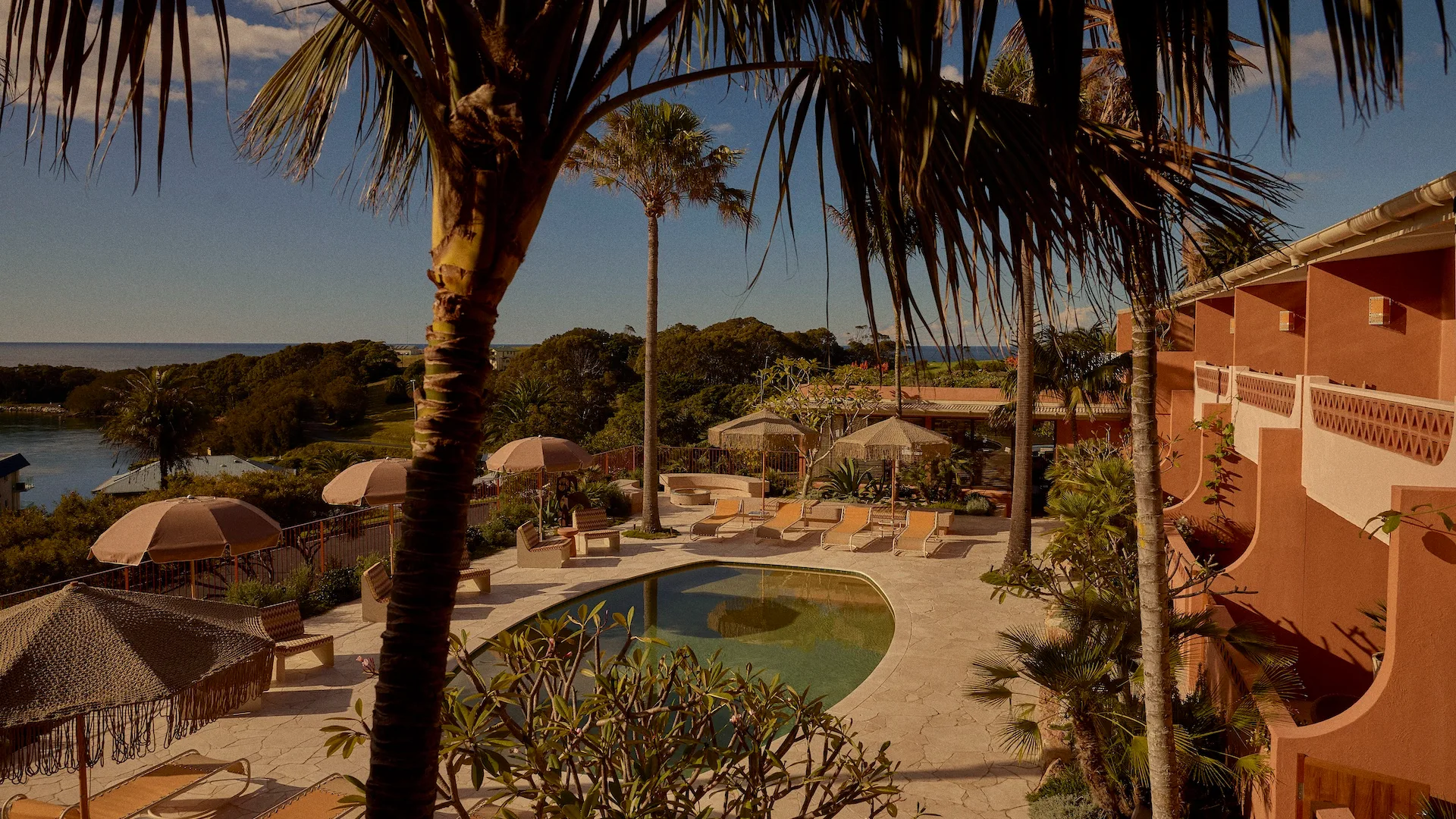 The exterior and pool area of Merivale's Narooma hotel The Whale
