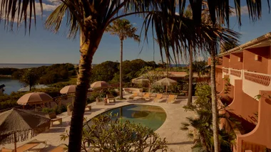 The exterior and pool area of Merivale's Narooma hotel The Whale