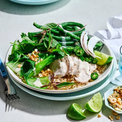 Warm coconut chicken and herb salad with brown rice
