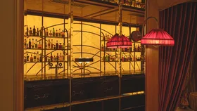 Old-world opulence prevails at The Grand Saddles Lodge's Art Deco piano bar, Ned's.