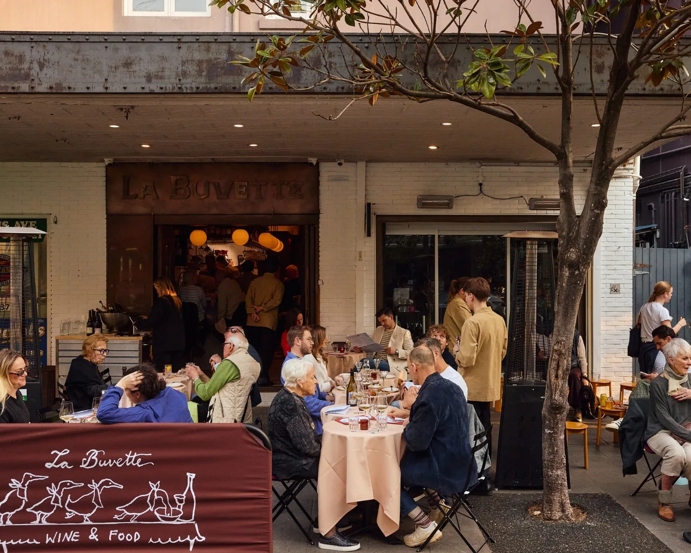 Busy exterior of Sydney's new bar La Buvette