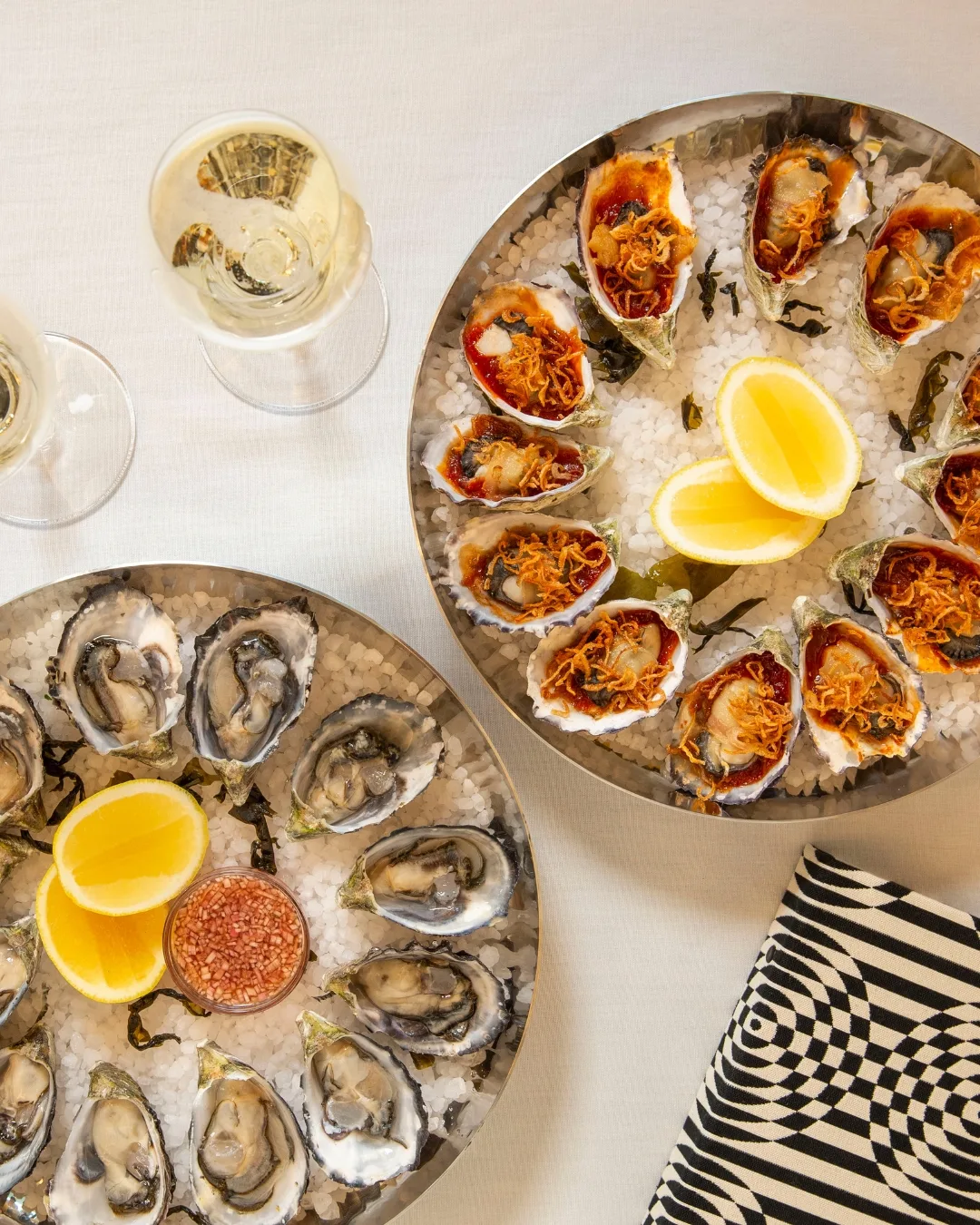 Oysters and oysters kilpatrick at Cottesloe's Gibney 