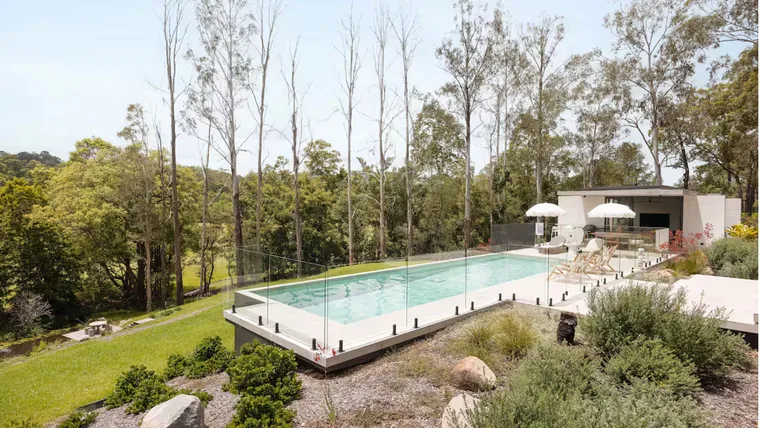 exterior of an Airbnb in Noosa with a pool and outdoor entertaining area