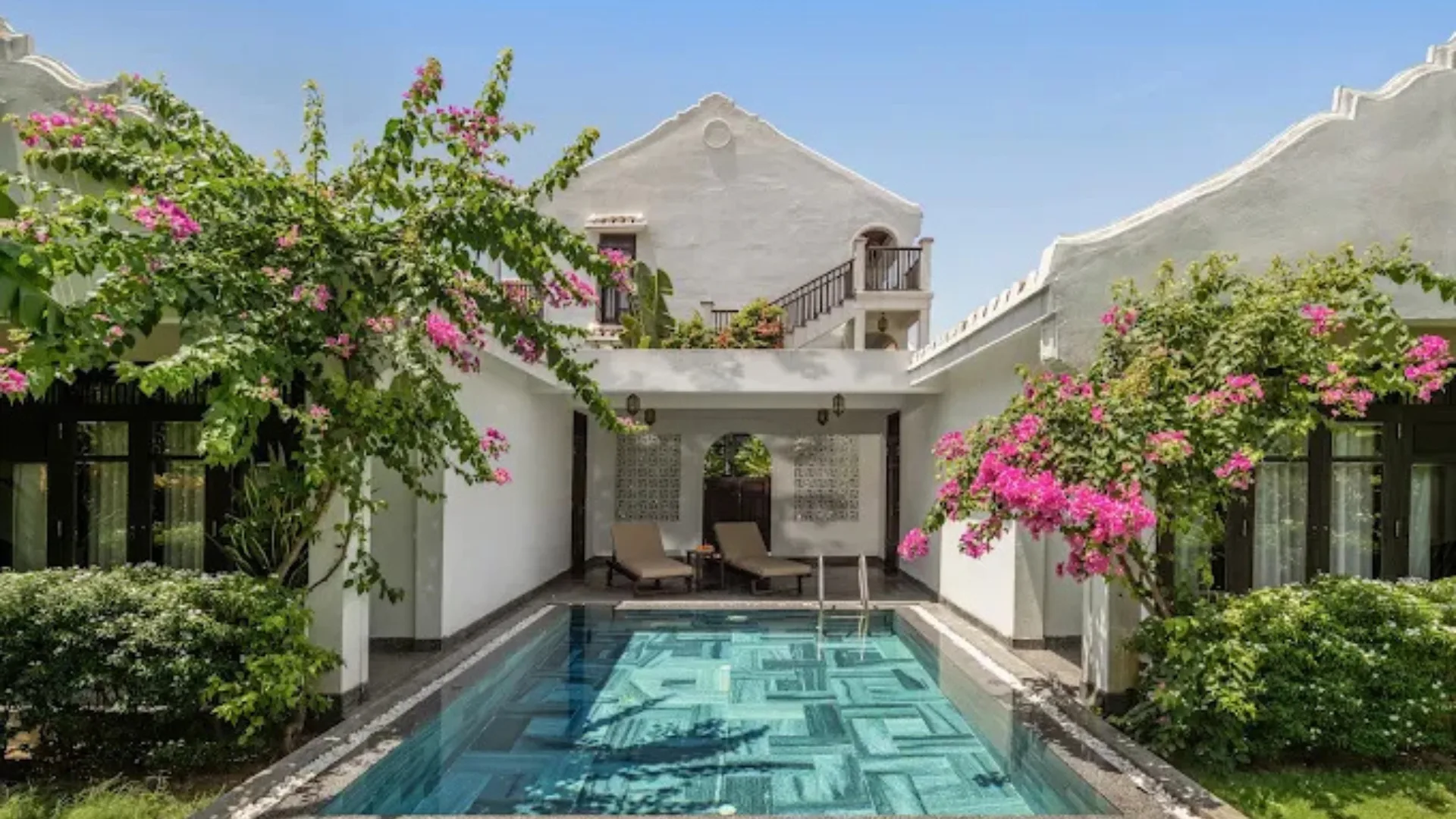 Bougainvillea-laced villas at Legacy Hoi An Resort in Cam Thanh