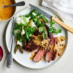 Seared bavette with asparagus and green peppercorn sauce