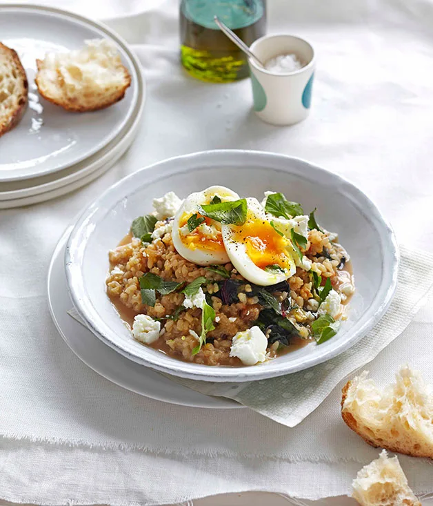 Braised rainbow silverbeet with brown rice, feta and egg