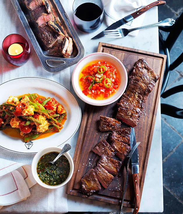 Char-grilled skirt steak and beef short ribs with salsa Criolla and chimichurri