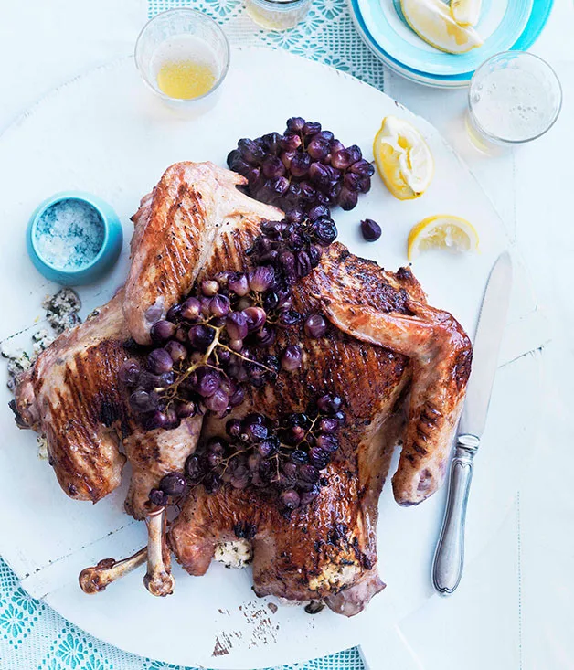 Whole barbecued turkey with buffalo ricotta and blistered grapes