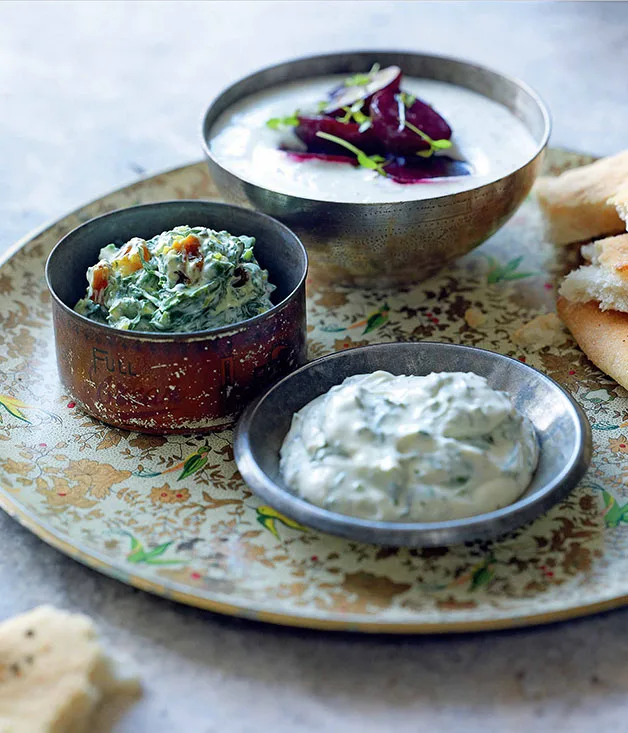 Borani-ye esfenaj (spinach, turmeric and golden raisin dip)