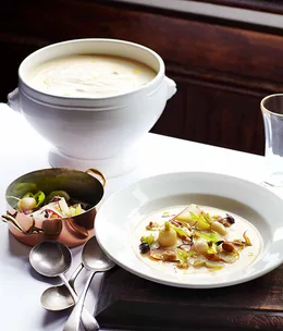 Swede soup with pickled hazelnuts and turnips