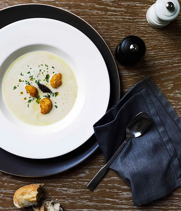 White onion velouté with crisp garlic and tapenade