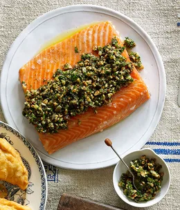 Slow-roasted ocean trout with walnut and coriander salsa