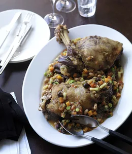 Lamb shoulder with tomato, fagioli and olive ragù