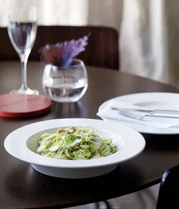 Shaved Brussels sprouts with walnuts, lemon and parmesan