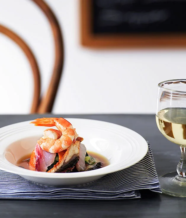 Raw fish, pickled cucumber and wakame salad