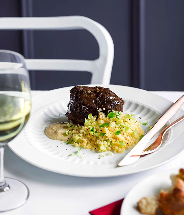 Braised beef cheek, burghul salad, and bread and anchovy sauce