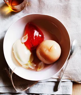 Poached white peaches with rose jelly and vanilla cream