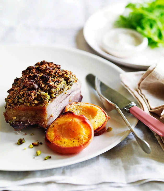 Pistachio-crusted pork with roasted peaches