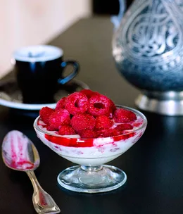 Raspberries, chewy ice-cream, and rosewater and grappa consommé