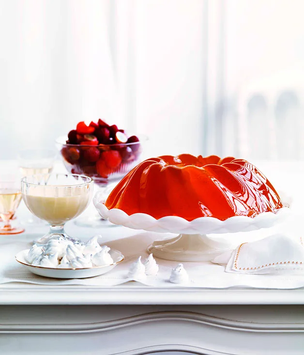 Sparkling vanilla jelly with melon and raspberry salad