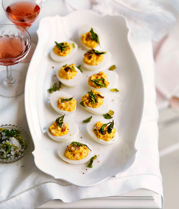 Devilled eggs with celery and coriander salt