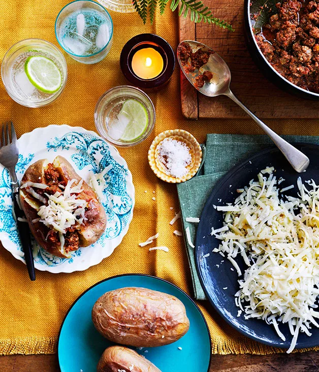 Jacket potatoes with Bolognese and cheese