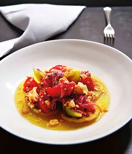 Tomato salad with sumac, shanklish and olive oil