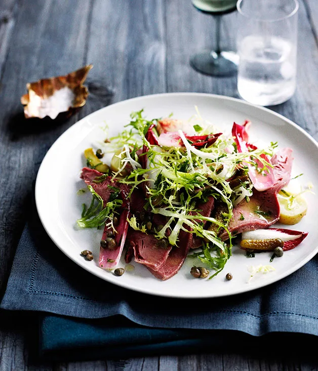 Salad of pickled veal tongue, bitter greens, potato and cornichons