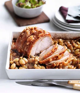 Verjuice-brined roast pork with crushed grapes
