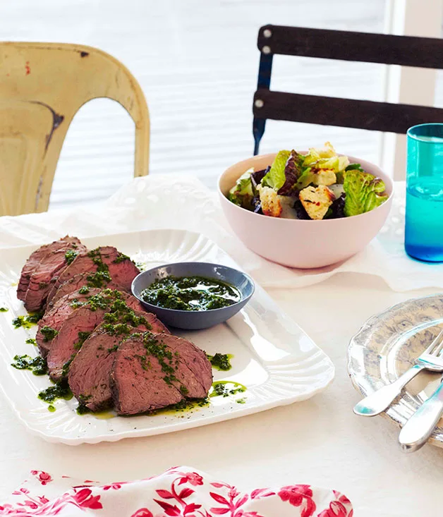 Rare roast beef with anchovies, garlic and rocket salsa verde