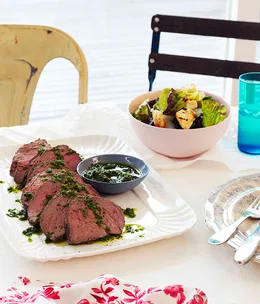 Rare roast beef with anchovies, garlic and rocket salsa verde