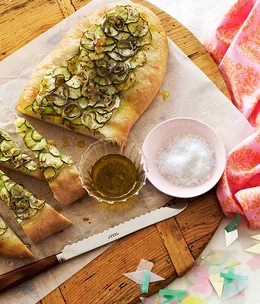 Zucchini schiacciata with green garlic oil