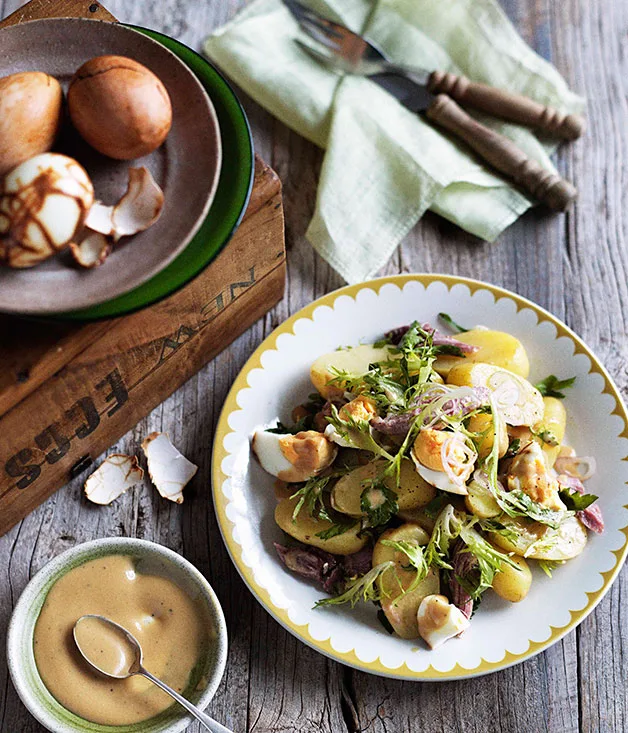 Smoked ham, smoked egg and potato salad with mustard dressing
