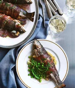 Cider-roast rainbow trout with leek and prosciutto