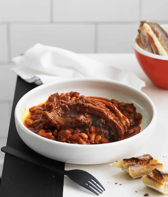 Pork ribs with baked beans recipe | Gourmet Traveller