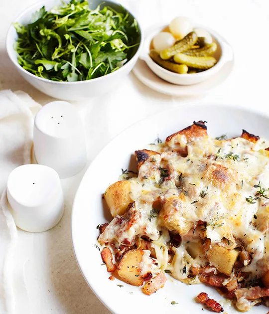Raclette with smoked bacon and fine herb salad recipe | Gourmet Traveller