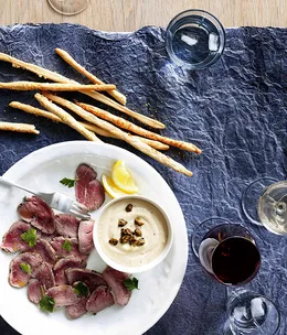 Tuna dip with parmesan grissini and cured veal