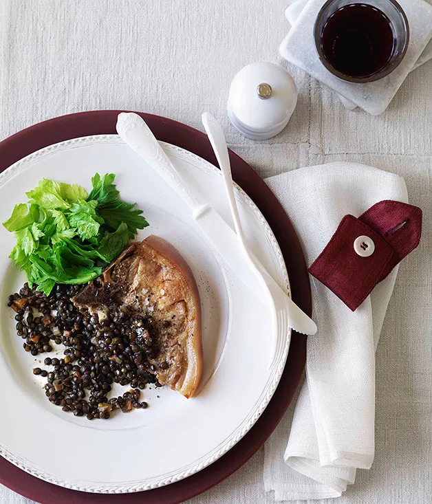 Confit pork chops with braised green lentils