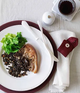 Confit pork chops with braised green lentils