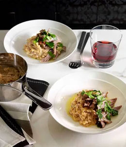 Slow-roast harissa lamb shoulder with chickpeas and parsley