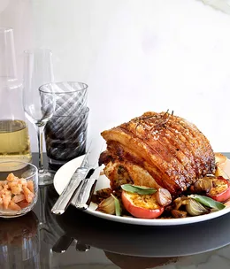 Rolled roast pork loin with apple and chestnuts
