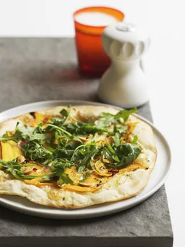 Pumpkin, taleggio and wild rocket pizza | Gourmet Traveller
