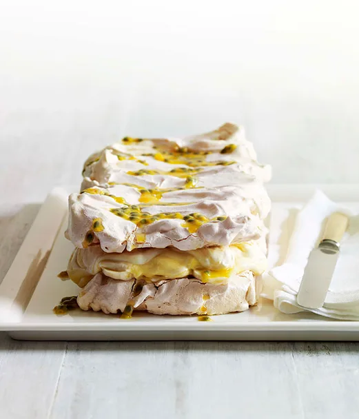 Meringue, banana and passionfruit curd cake