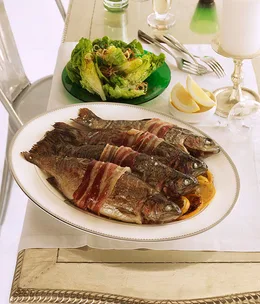 Roast rainbow trout with fennel, lemon and pancetta