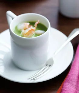 Chilled pea and mint soup with poached prawns