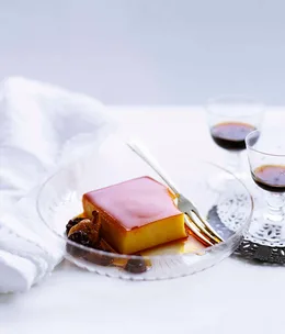 Flan with orange-caramel soaked raisins and wild figs