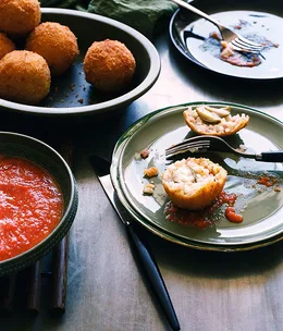 Olive and Taleggio arancini with fresh tomato sauce