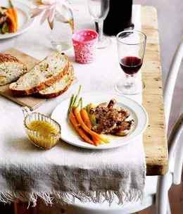 Pot-roasted squab with Dutch carrots and green onions