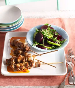Pork, rabbit and chorizo skewers with paprika oil and beetroot, apple and watercress salad