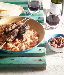 Lamb kofta with tomato rice and sumac fried onions